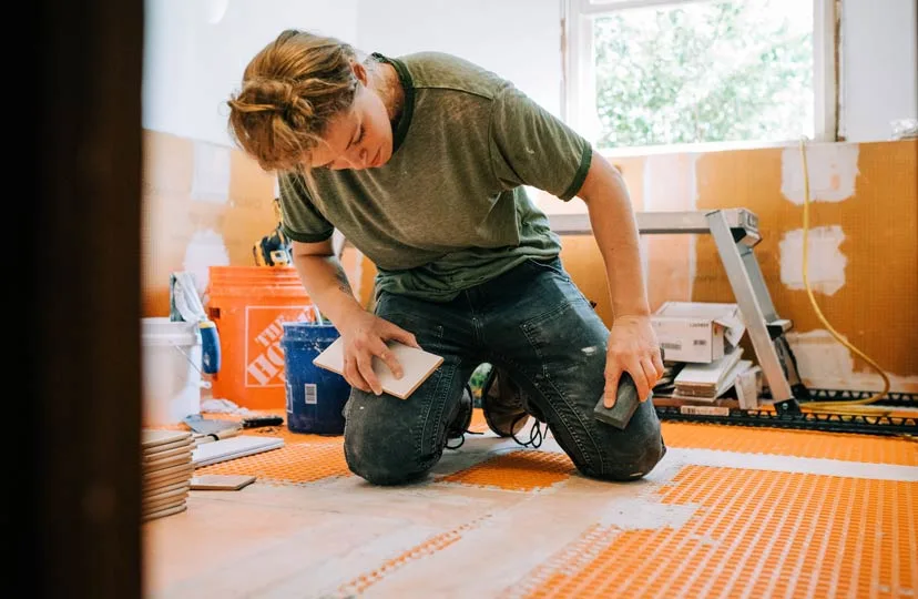 Unlike you, this professional flooring installer knows what she's doing. Just saying.